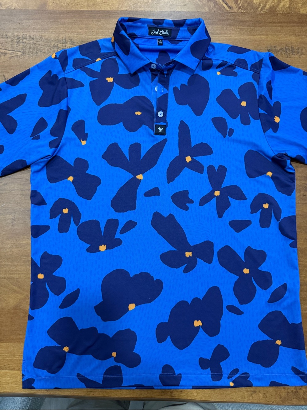 Bad Birdie Blue Floral Print Polo with Navy & Gold Accents